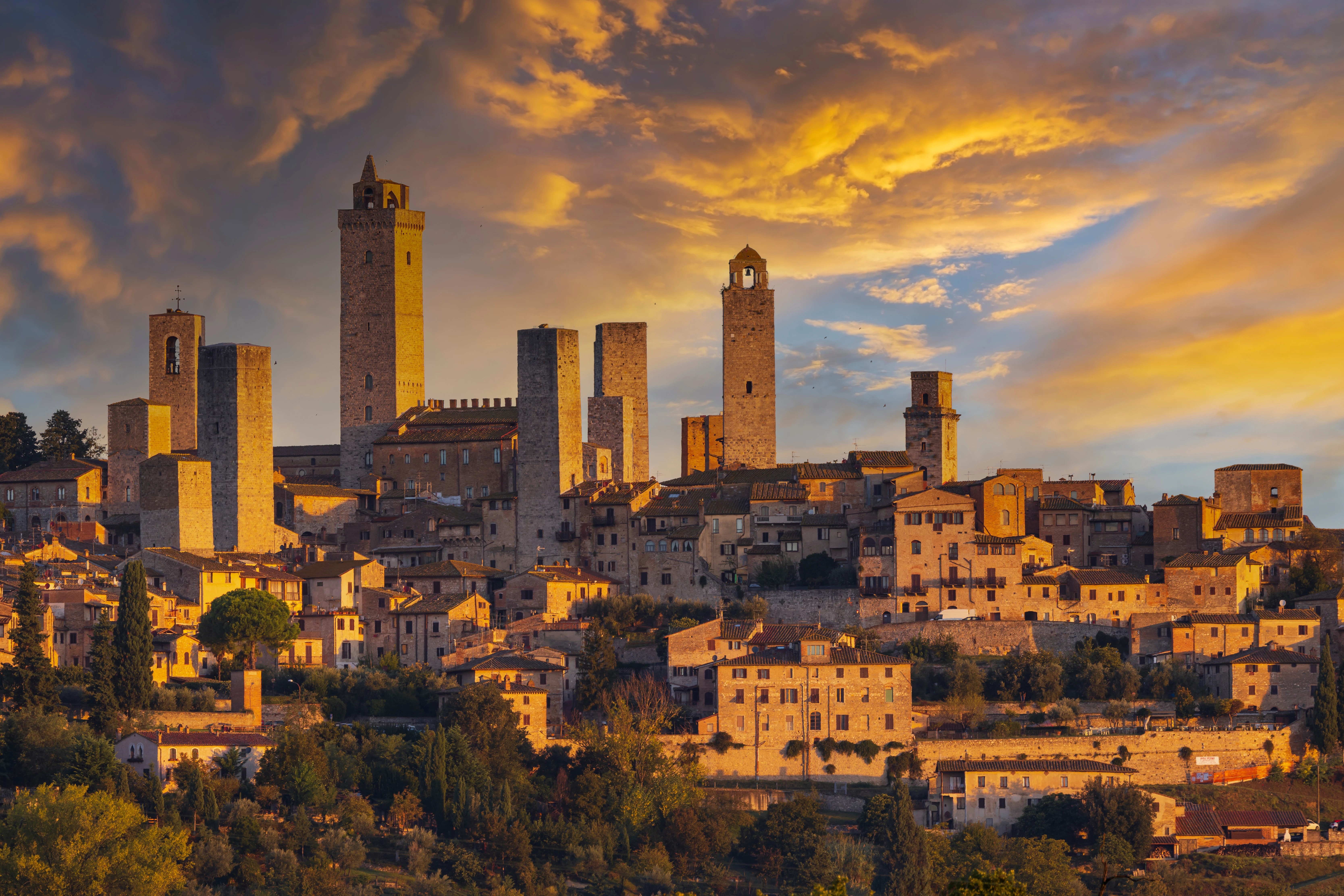 Scenic San Gimignano in Tuscany, Italy, featuring its iconic medieval towers and beautiful countryside views.